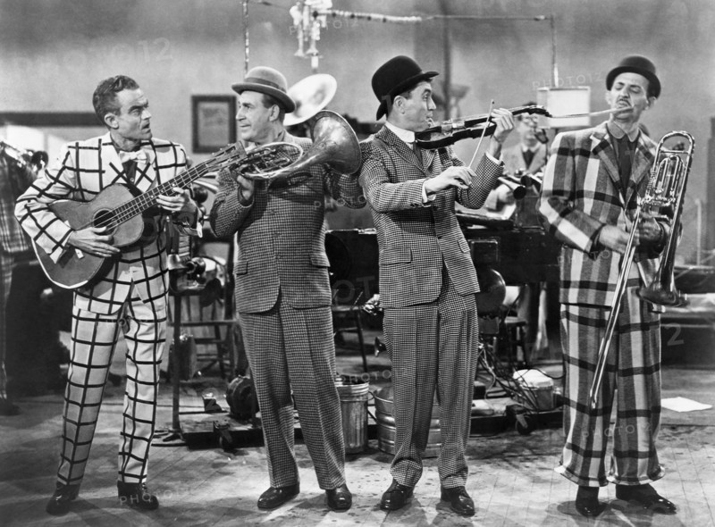 Spike Jones (Left) and his City Slickers, Mickey Katz (Far R), on-set of the Film, "Fireman Save my Child", 1954