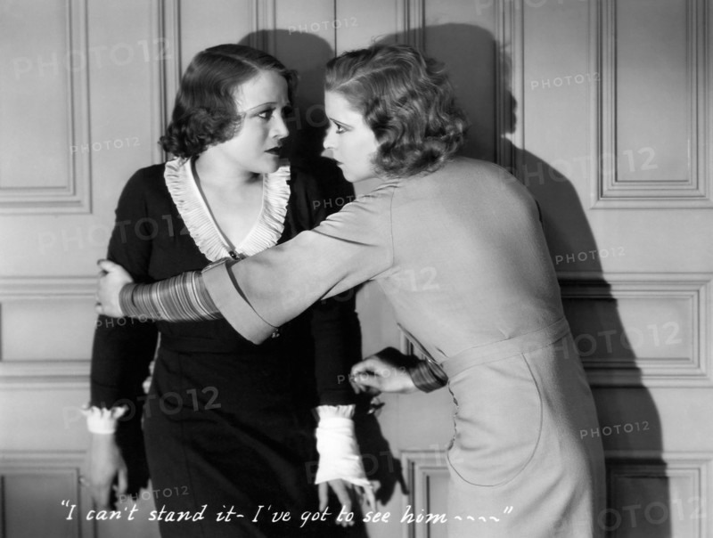 Juliette Compton and Clara Bow, on-set of the Film, "Kick In", 1931