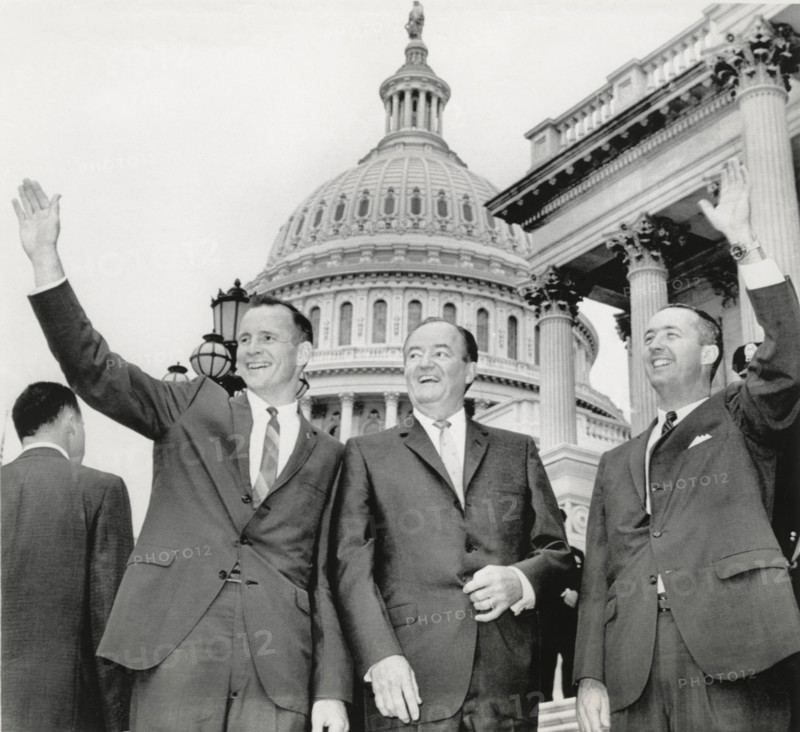 Astronauts Edward White II (L) and James McDivitt (R) with U.S. Vice President Hubert Humphrey on Steps of Capitol Building, Washington DC, USA, 1965