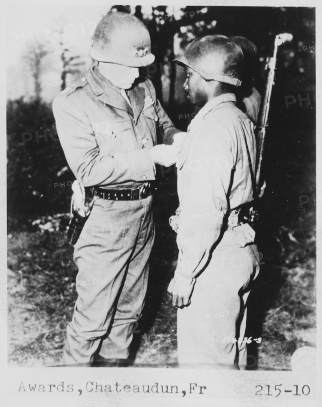 Lt. General George S. Patton Pins Silver Star on Private Ernest A. Jenkin after Liberation of Chateaudun, France, Oct. 13, 1944