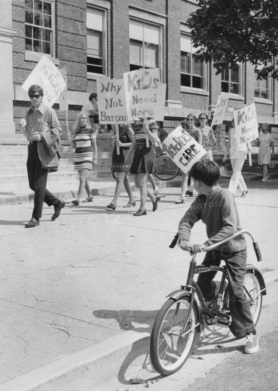Student on Bicycle Watching Teachers Picketing Outside High School, Elgin, Illinois, USA, 1971