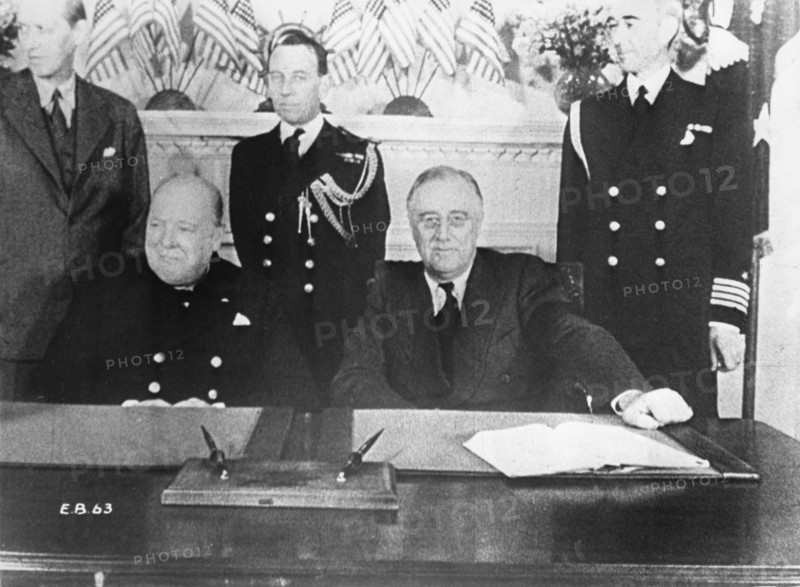 Prime Minister Winston Churchill (L) and President Franklin D. Roosevelt at Conference Table, White House, Washington, DC,  Dec. 22, 1941