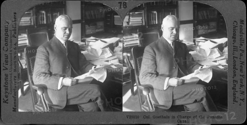 Colonel George W. Goethals Sitting at Desk Reading Documents, "Col. Goethals in Charge of the Panama Canal", Stereo Card, circa 1917
