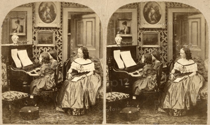 Seated Woman Behind Two Seated Girls Playing Piano, Evening Music, Stereo Card, circa 1890