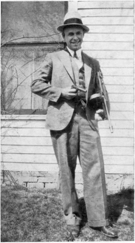 John Dillinger (1903-1934), American Gangster, Portrait holding Toy Gun Used to Escape Jail in Crown Point, Indiana, USA, 1934