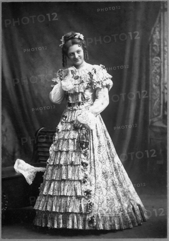 Woman in Long Floral Dress with Hoop Skirt, Portrait, circa 1897