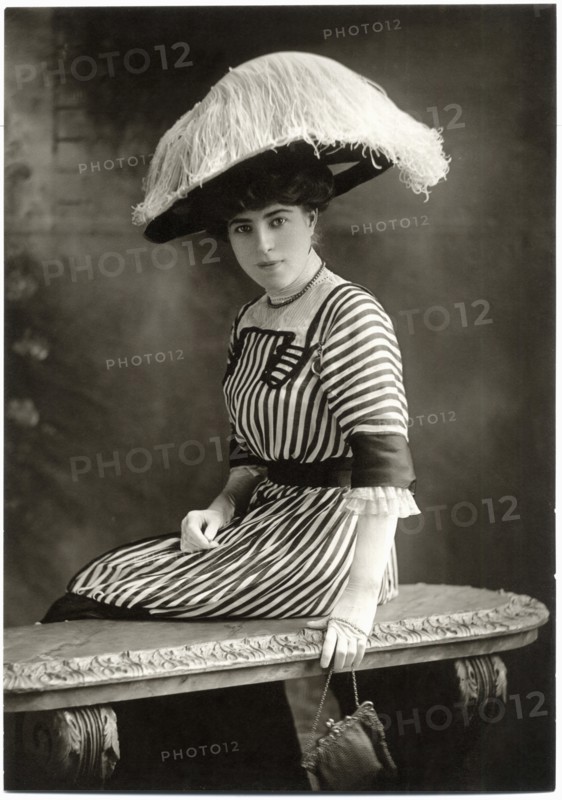 Fashionable Woman, Seated, in Striped Dress and Large Ostrich Hat, Chicago, Illinois, USA, circa 1915