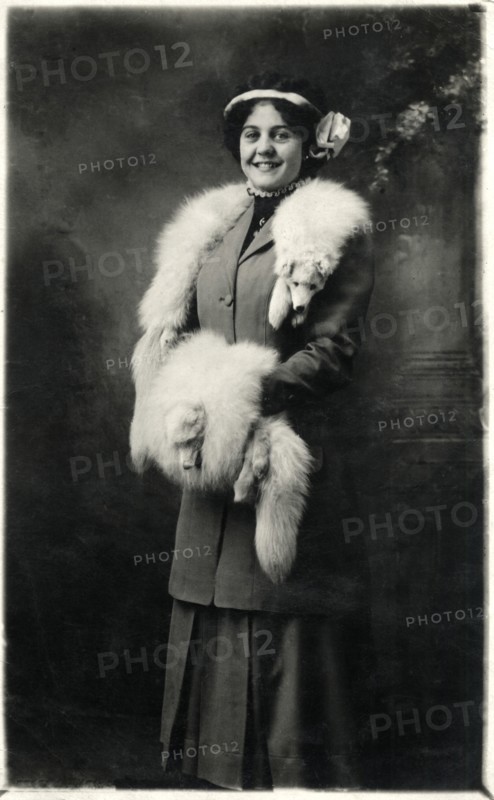 Smiling Woman Wearing Fox Fur Stole and Hand Muff, Portrait, circa 1918