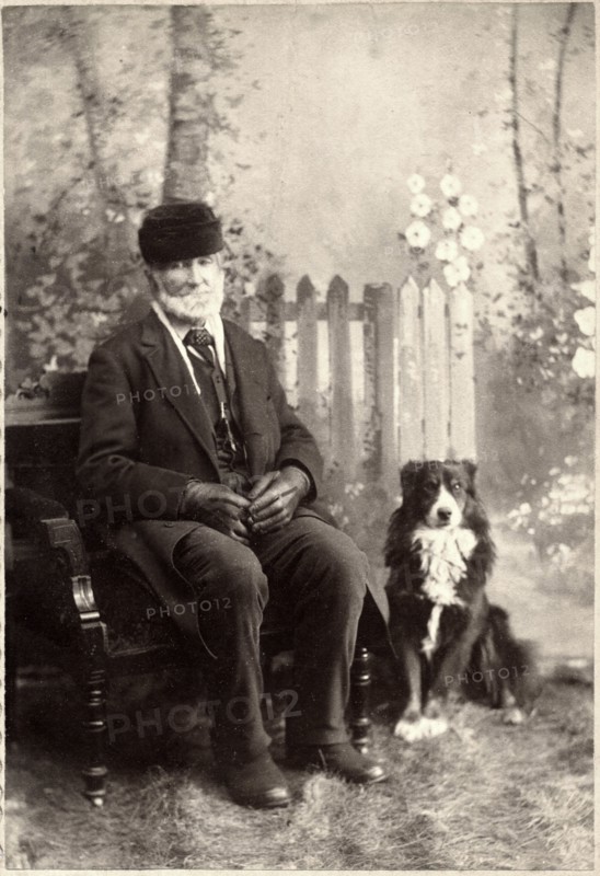 Seated Man on Bench with Dog, Studio Portrait, circa 1897