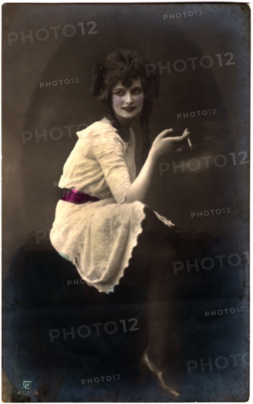 Seated Woman in White Dress and Red Sash Smoking Cigarette, Hand-Colored Postcard, Germany, circa 1920's
