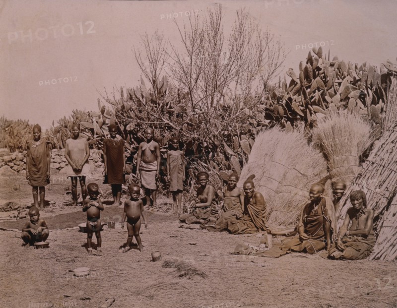 Group of Zulus in Village, Africa, circa 1890