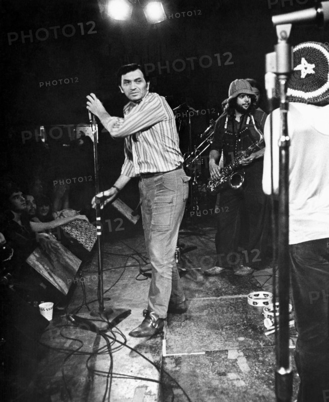 Bill Graham Setting up Microphone, on-set of the Documentary Film, "Fillmore", 1972