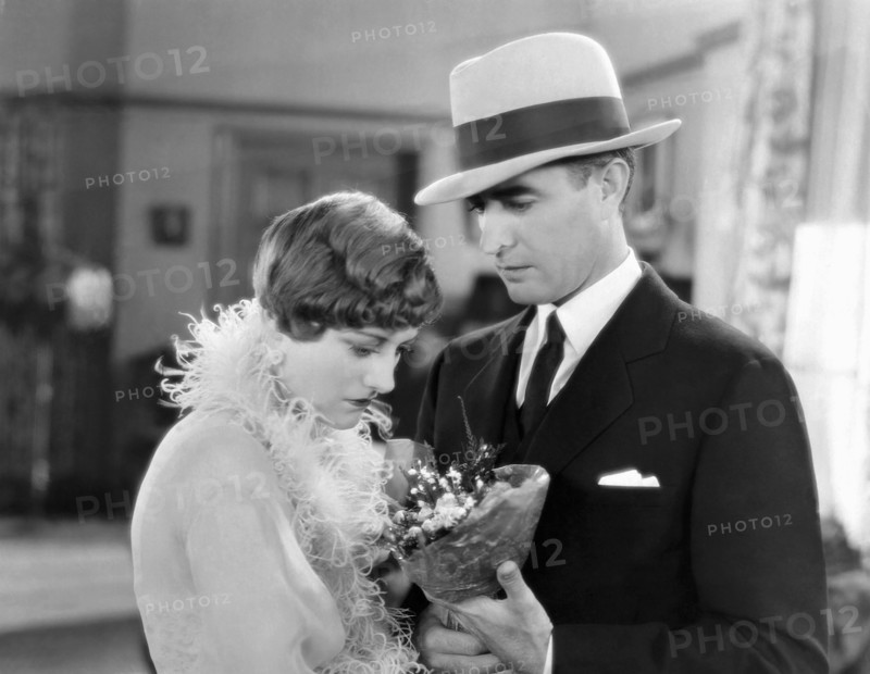 Joan Crawford, John Gilbert, on-set of the Silent Film, "Four Walls", 1928
