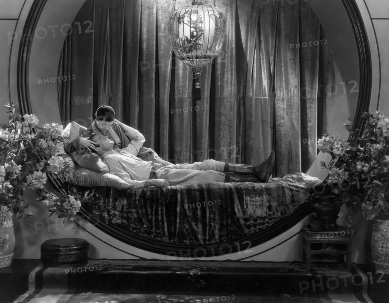 Myrna Loy, Charles Starrett, on-set of the Film, "The Mask of Fu Manchu", 1932