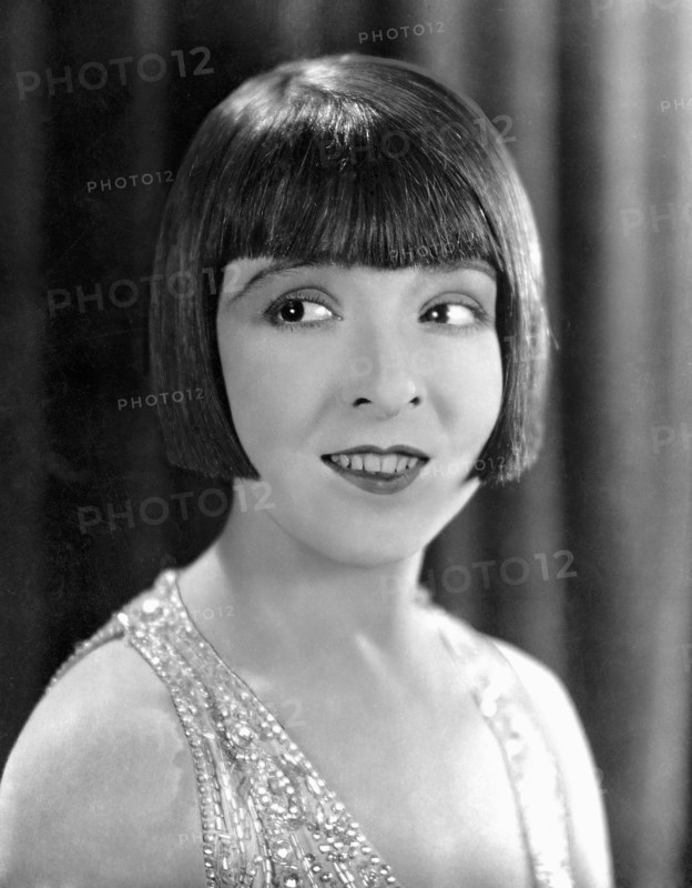 Colleen Moore, publicity portrait for the silent film, "The Desert Flower", 1925
