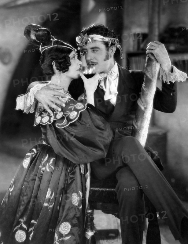 Renee Adoree, John Gilbert, on-set of the silent film, "The Boheme", 1926