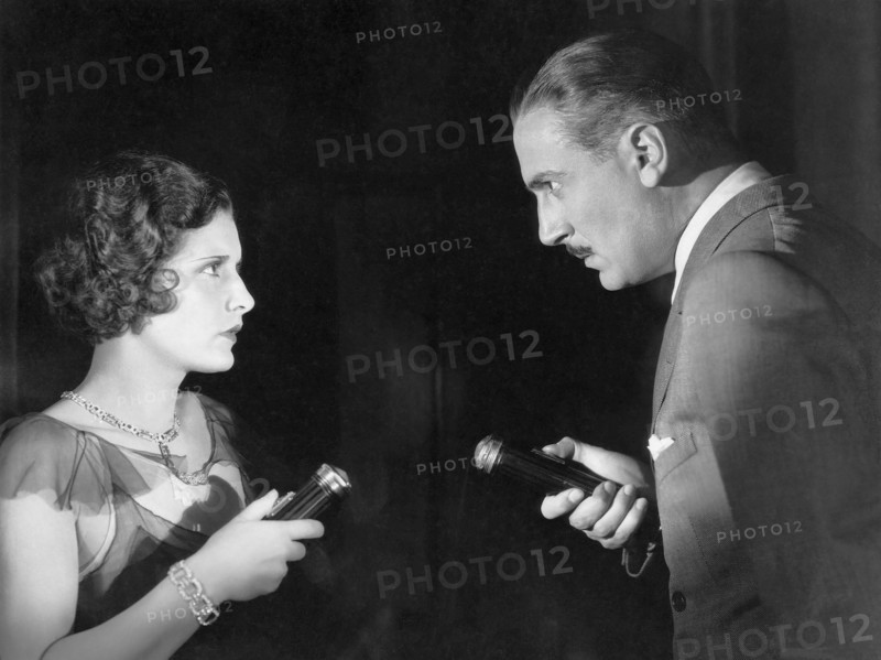 Evelyn Brent, Paul Lukas, on-set of the Film "Slightly Scarlet", 1930