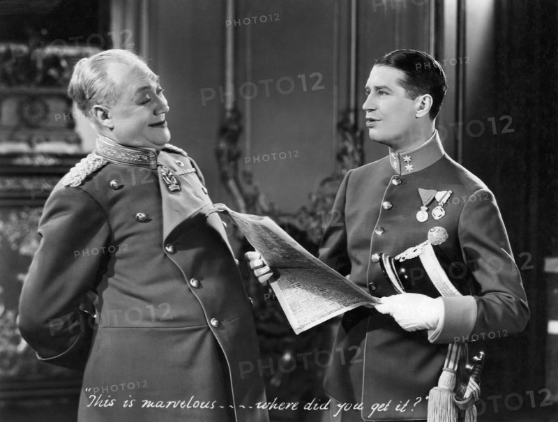 George Barbier, Maurice Chevalier, on-set of the Film "The Smiling Lieutenant", 1931