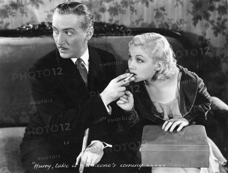 Paul Lukas, Judith Wood, on-set of the Film "Working Girls", 1931