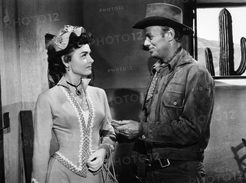 Donna Reed, Richard Widmark, on-set of the Film "Backlash", 1956