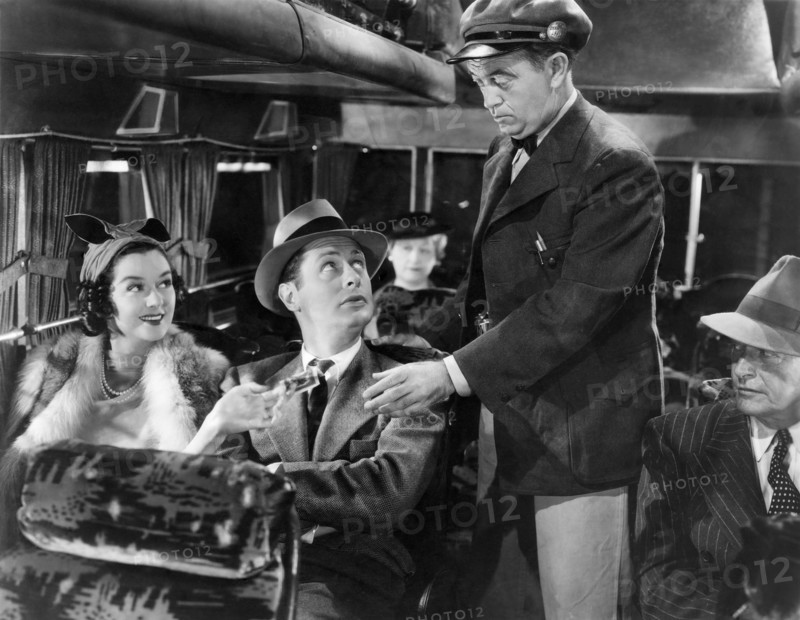 Rosalind Russell, Robert Montgomery, George Cooper, on-set of the Film "Live, Love and Learn", 1937