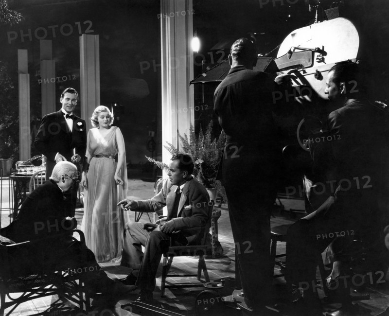 Lionel Barrymore, Walter Pidgeon, Jean Harlow, director Jack Conway, on-set of the Film "Saratoga", 1937