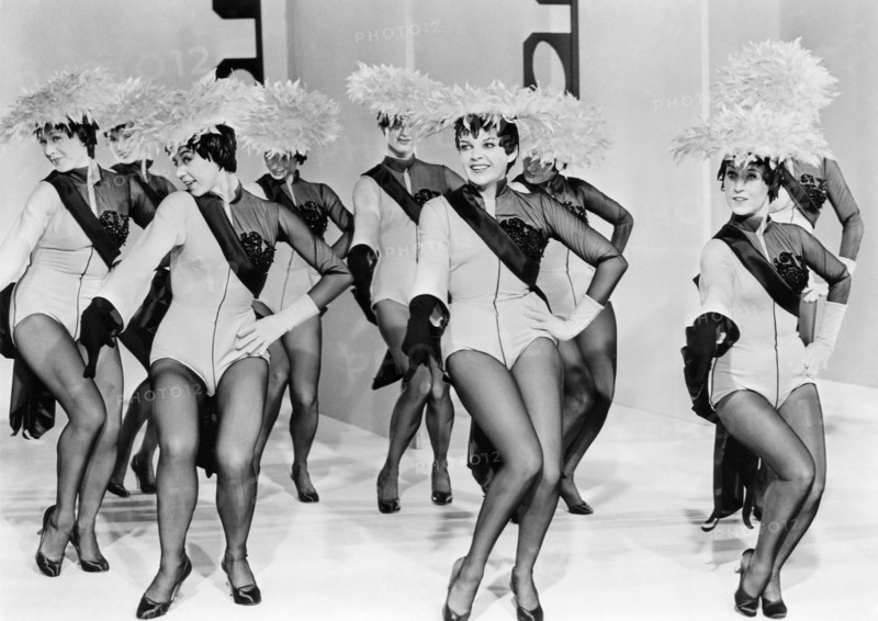 Judy Garland with Showgirls, on-set of the Film "A Star is Born", 1954
