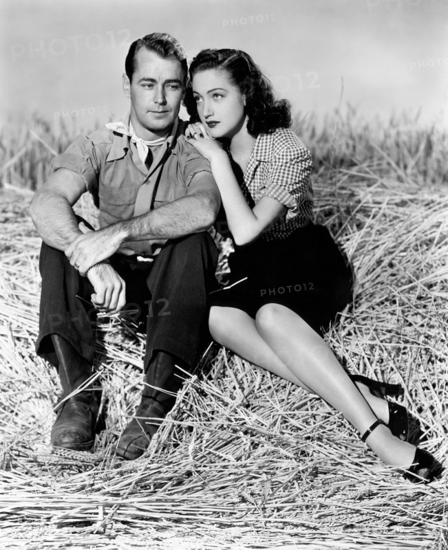 Alan Ladd, Dorothy Lamour, on-set of the Film "Wild Harvest", 1947