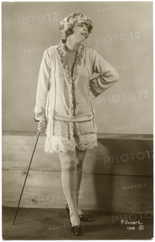 Portrait of Fashionable Woman in Short Skirt and Leaning on Cane, French Postcard, circa 1930