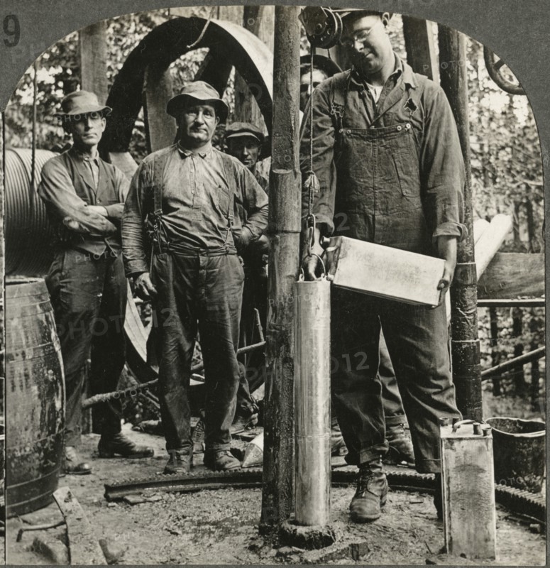 Filling Shell with Nitro-Glycerine, Preparatory to Shooting the Well, Oil Field in Penn’s”, Single Image of Stereo Card, circa 1915