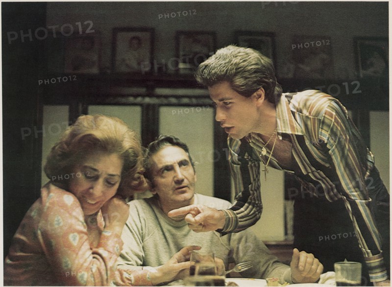 Julie Bovasso, Val Bisoglio, John Travolta, on-set of the Film, "Saturday Night Fever", 1977