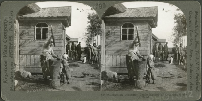 Russian Peasants-Crude Method of Crushing Grain by Hand, Stereo Card, Keystone View Company