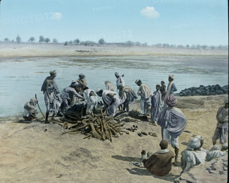 Corpse on Pyre, Hindu Funeral, Lower Ganges, Uttar Pradesh, India, Hand-Colored Magic Lantern Slide, Newton & Company, 1930