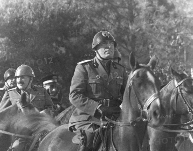 Benito Mussolini, on horseback, during Parade honoring Birthday of King Victor Emmanuel III, Rome, Italy, November 20, 1935