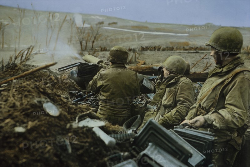 Firing a .30-caliber Machine Gun M1917A1 near Saarburg, Germany, Rhineland Campaign, 1945