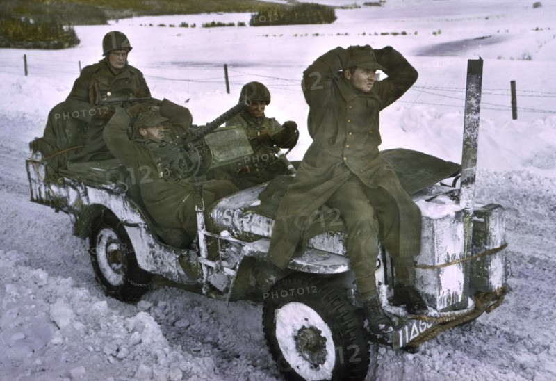Two German Prisoners Being Brought in, Ardennes-Alsace Campaign, Battle of the Bulge, 1945