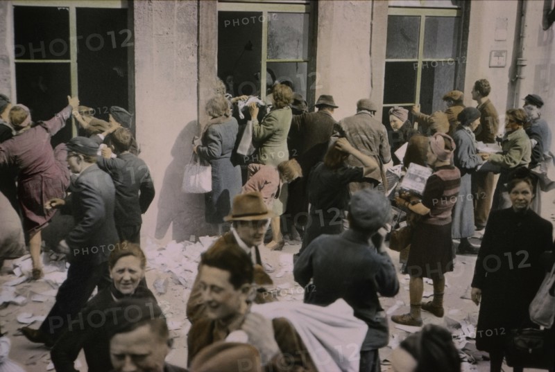 Liberated Slave Laborers Help Themselves to Food and Supplies in Store, Hanover, Germany, Central Europe Campaign, Western Allied Invasion of Germany, 1945
