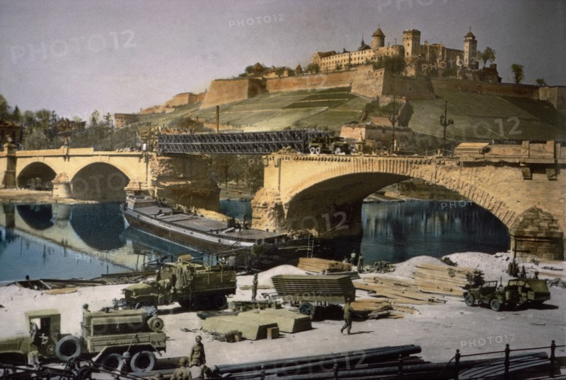 Traffic moving across Main River at Wurzburg, Germany, Central Europe Campaign, Western Allied Invasion of Germany, 1945