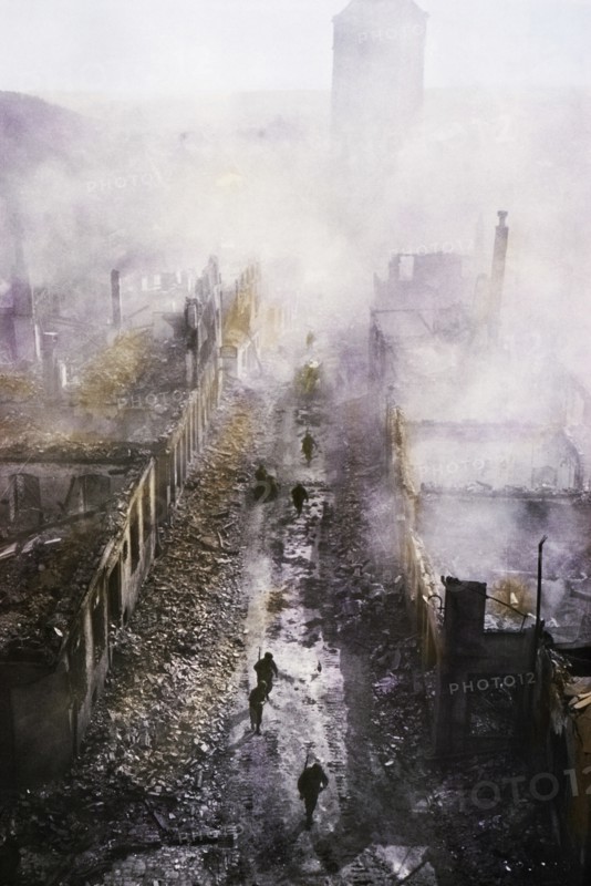 Infantrymen Moving Down Street during Seventy Army Advance, Waldenburg, Germany, Central Europe Campaign, Western Allied Invasion of Germany, 1945