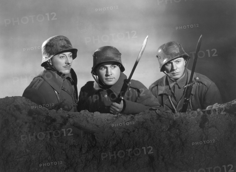 John Emery, Noah Beery, Jr., Henry Hunter, on-set of the Film, "The Road Back", Universal Pictures, 1937