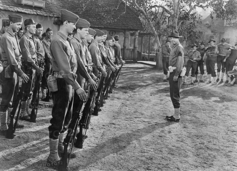Dan Dailey (Standing alone right), on-set of the Silent Film, "What Price Glory", 20th Century Fox, 1952