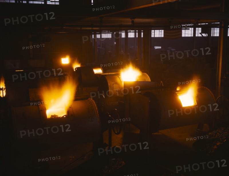 Rotary, Oil-Fired Melting Furnaces, Destination of the Finished Aluminum Products is Kept Secret, Aluminum Industries, Inc., Ohio, USA, Alfred T. Palmer for Office of War Information, February 1942