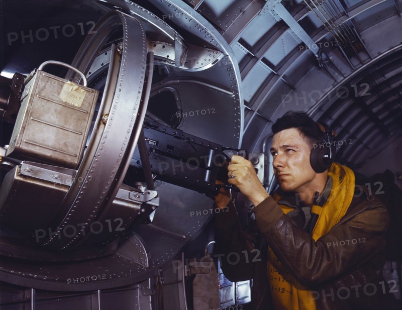 Man at Side Machine Gun of YB-17 Bomber, Langley Air Force Base, Hampton, Virginia, USA, Alfred T. Palmer for Office of War Information, May 1942