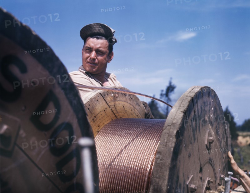 Construction Worker Building 33,000 Electric Power Line, Fort Knox, Kentucky, USA, Alfred T. Palmer for Office of War Information, June 1942