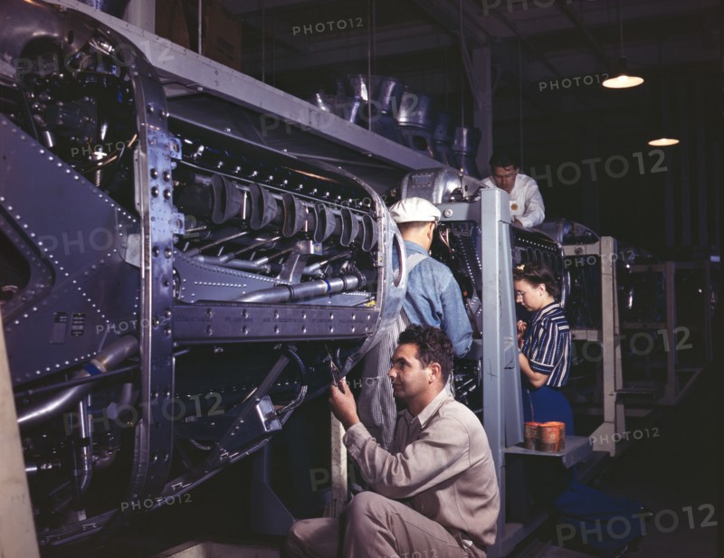 Workers Assembling Cowling on Allison Motors for P-51 Fighter Planes, North American Aviation, Inc., Inglewood, California, USA, Alfred T Palmer for Office of War Information, October 1942