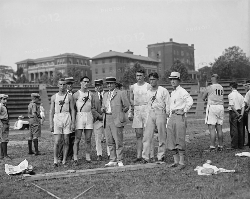 Shot Putter Harry S. Leversedge (standing third from right), USMC, Track & Field Meet, South Atlantic Champs, 1925