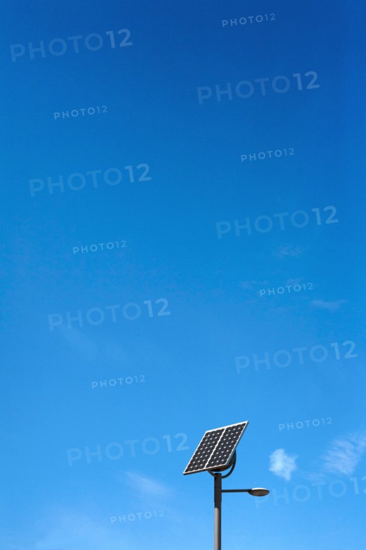 Solar Powered Street Light against Blue Sky