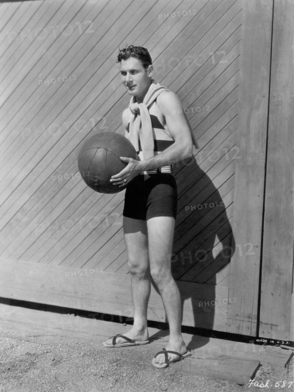 Actor Richard Arlen, Publicity Portrait in Swimsuit Holding Medicine Ball, Paramount Pictures, 1931