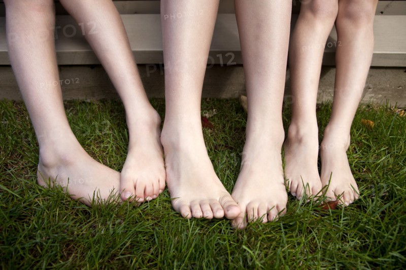 Three Pairs of Bare Legs