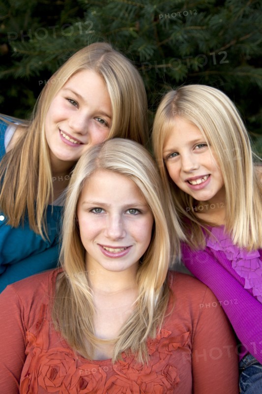 Three Smiling Blonde Girls